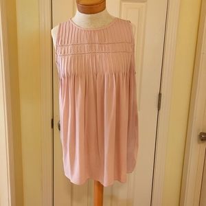 Sleeveless smocked front, blush blouse